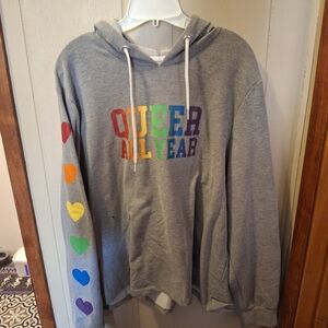 Queer All Year Gray Hoodie with Rainbow Hearts